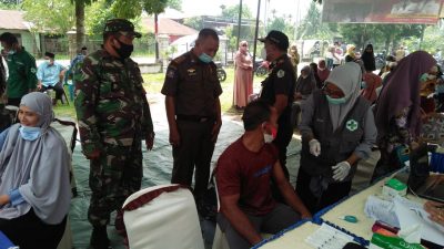 Babinsa Koramil Jajaran Kodim 0103/Aceh Utara Terus Kawal Kegiatan Vaksinasi
