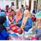 Kader Posyandu tengah memberikan pelayanan kesehatan bagi masyarakat (Foto: Istimewa)