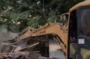 Proses penggusuran bangunan liar di Kecamatan Medansatria Kota Bekasi. 